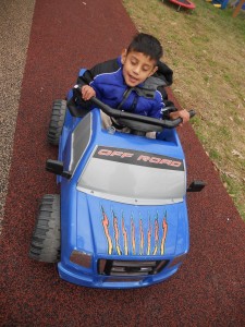 Client driving the Therapeutic Pedal Car
