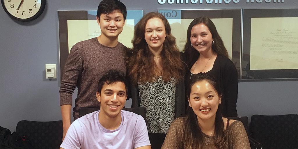 The Enabling Precision Health and Medicine Bass Connections sub team working on the WearDuke Initiative. First row, left to right: Nathan Parikh and Christine Wang; Back row: Grant Kim, Lauren Willis and Sarah Bond.