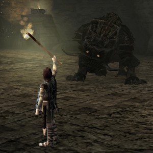One of the colossi, cowering in fear of the player's torch. In order to kill it, the player must chase it off a cliff.