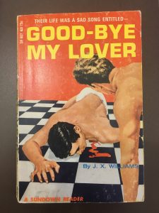A queer pulp fiction titled "Goodbye My Lover" depicting two shirtless men, one lying injured on the ground and the other overlooking.