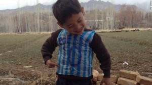 Credit: Arif Ahmadi courtesy of CNN.com "An image posted to Hamayon's Facebook page shows his little brother dancing in his makeshift shirt." http://edition.cnn.com/2016/01/27/football/messi-boy-murtaza-ahmadi/