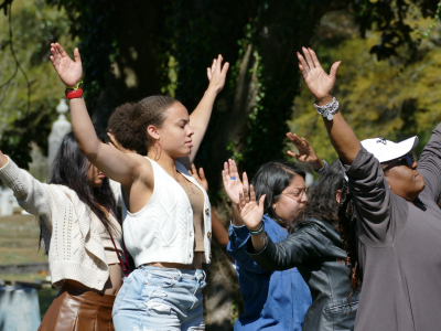 Aya Shabu leads the class in a flocking exercise at Pine Forest Cemetery.