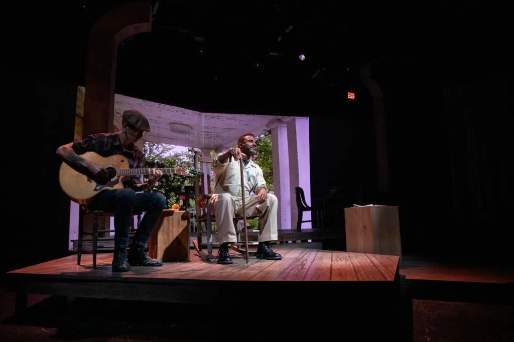 Mike Wiley and Corbie Hill on stage performing Changing Same