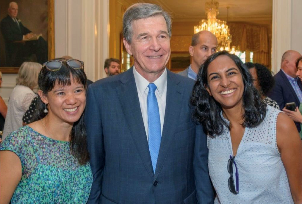 Madhu Vulimiri, right, with Governor Cooper and Dr. Wong.