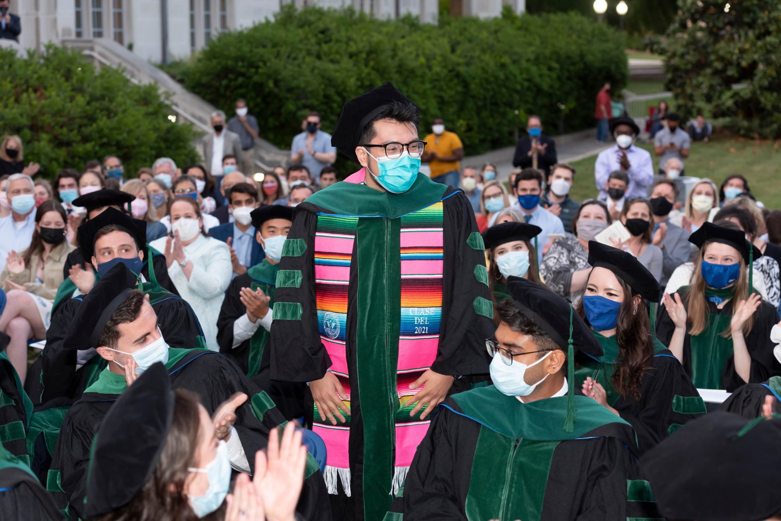 Alex Villeda receives the Dr. Armstrong "Living the Dream" Award on graduation day