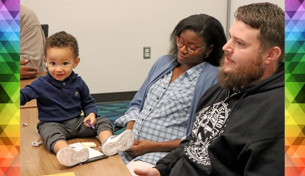 A Durham family participates in a session with Duke researchers, giving feedback on study design.