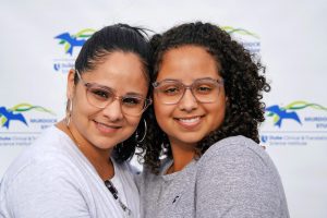 Smiling photo of two sisters enrolled in the MURDOCK study