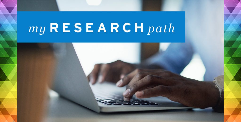 Photo of hands typing on a laptop with myRESEARCHpath wordmark overlaid on the image
