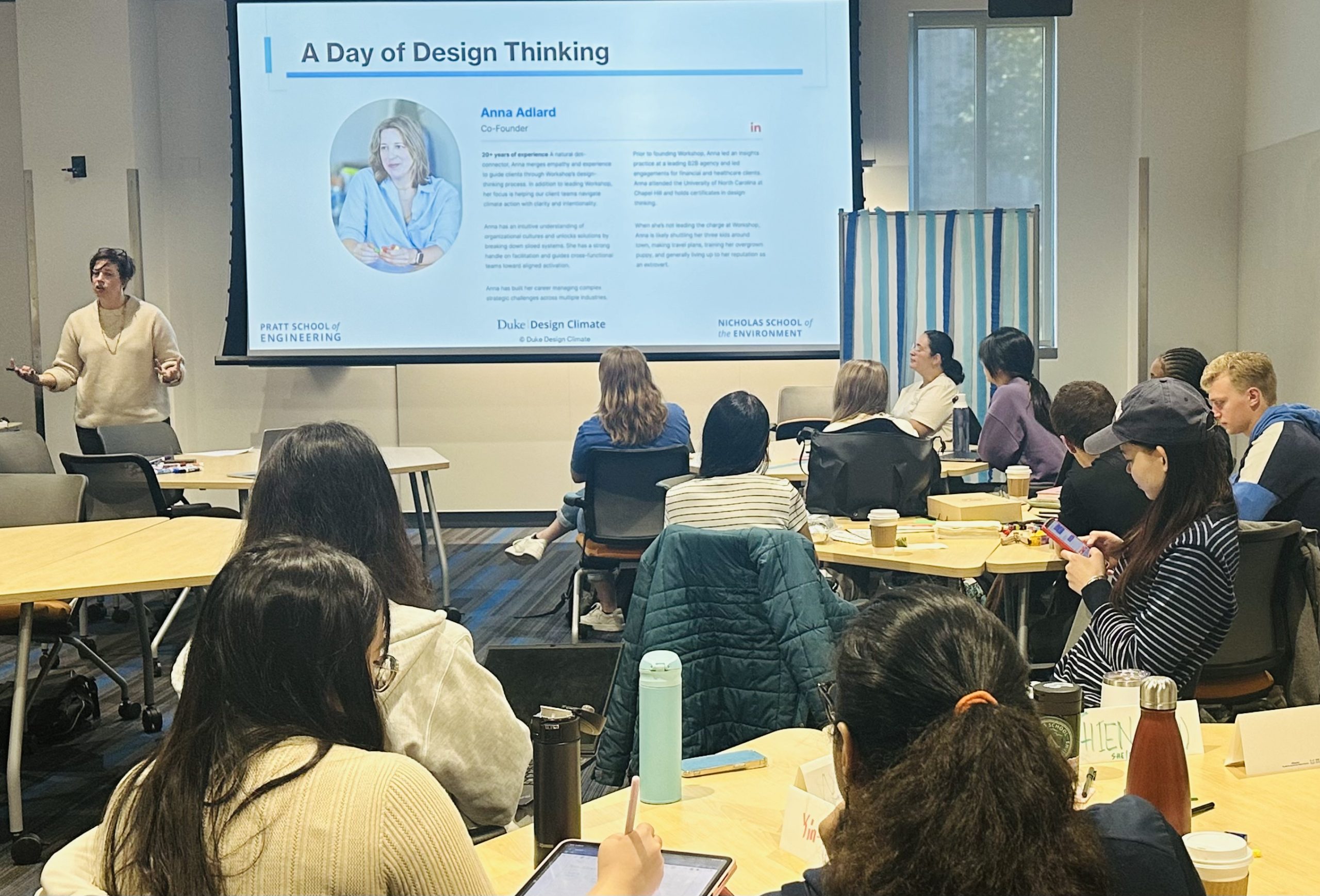 students at a workshop with presentation