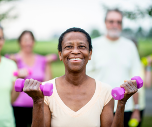 Older woman with hand weights