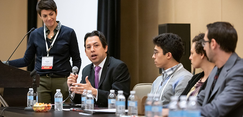 Edgar presenting at a meeting.