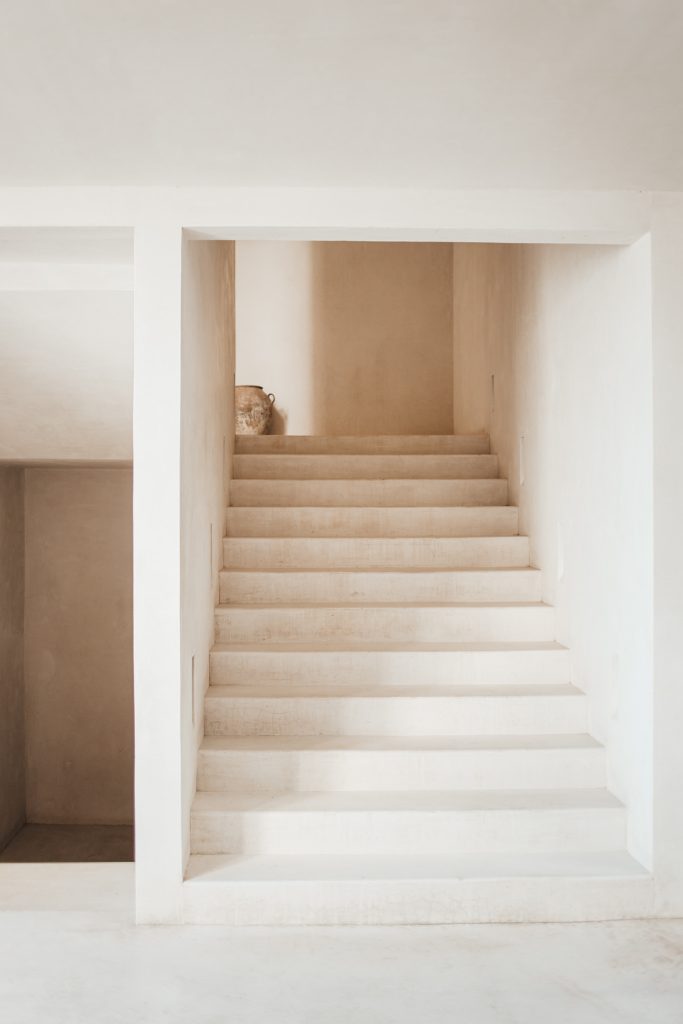 cream colored stairs and wall